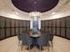 Elegant wine room with custom storage and a unique chandelier at 540 N Tamiami Trl # 1503, Sarasota, FL 34236
