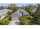 Charming single-story home with a two-car garage, lush landscaping, and a well-manicured lawn in a suburban neighborhood at 5515 Simonton St, Bradenton, FL 34203