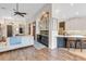 Inviting living room seamlessly connects to the kitchen, creating an ideal space for entertaining and modern living at 5515 Simonton St, Bradenton, FL 34203