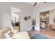 Cozy living room with stone fireplace, comfortable seating, and open layout at 5515 Simonton St, Bradenton, FL 34203