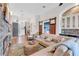 Spacious living room features stylish furnishings, modern lighting, and a welcoming atmosphere at 5515 Simonton St, Bradenton, FL 34203