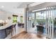 Bright living space seamlessly connects indoors with the outdoor patio, offering a relaxed, airy atmosphere at 5515 Simonton St, Bradenton, FL 34203
