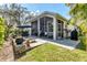 Beautiful outdoor patio with ample seating and lush landscaping, ideal for enjoying the outdoors at 5515 Simonton St, Bradenton, FL 34203