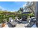 Outdoor lounge area with comfortable seating and stylish decor, perfect for entertaining and relaxation at 5515 Simonton St, Bradenton, FL 34203