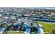 Beautiful waterfront home with lush landscaping, a well-manicured lawn, and a private boat dock at 556 Regatta Way, Bradenton, FL 34208