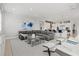 Spacious living room featuring an open concept design and modern decor at 556 Regatta Way, Bradenton, FL 34208