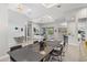 Open-concept space with dining area, living room, and kitchen, perfect for entertaining at 556 Regatta Way, Bradenton, FL 34208