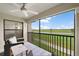 Relaxing balcony with ceiling fan and gorgeous views of the lush golf course and peaceful lake at 5694 Palmer Cir # 204, Lakewood Ranch, FL 34211