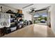 Well-lit garage featuring an automatic overhead door, plenty of storage shelves, and ample open space at 5694 Palmer Cir # 204, Lakewood Ranch, FL 34211