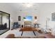Bright living room with a cozy seating arrangement and modern decor at 5694 Palmer Cir # 204, Lakewood Ranch, FL 34211