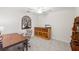 Bright office space with desk, shelving, and ceiling fan, ideal for remote work at 5694 Palmer Cir # 204, Lakewood Ranch, FL 34211