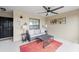 Relax on this cozy covered patio with comfortable seating and a ceiling fan, perfect for enjoying the outdoors at 5694 Palmer Cir # 204, Lakewood Ranch, FL 34211
