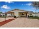 Duplex featuring matching units with covered parking and well-maintained landscaping at 5808 18Th W St # A & B, Bradenton, FL 34207