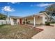 Well-maintained home with a covered carport, brick-paved driveway, and classic charm at 5808 18Th W St # A & B, Bradenton, FL 34207