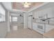 View of the open-concept kitchen and living room featuring stainless steel appliances at 5808 18Th W St # A & B, Bradenton, FL 34207