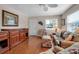 Comfortable living room with hardwood floors, natural light, and stylish seating arrangement at 5808 18Th W St # A & B, Bradenton, FL 34207
