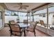 Relaxing screened-in patio with tiled floor, ceiling fan, and view of backyard at 5808 18Th W St # A & B, Bradenton, FL 34207