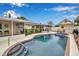 Inviting backyard pool featuring a spa and lush landscaping, perfect for relaxation and entertaining at 5808 18Th W St # A & B, Bradenton, FL 34207