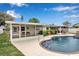 Inviting backyard pool featuring a spa and lush landscaping, perfect for relaxation and entertaining at 5808 18Th W St # A & B, Bradenton, FL 34207