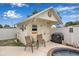 Charming backyard shed with seating area and mature landscaping, great for outdoor enjoyment at 5808 18Th W St # A & B, Bradenton, FL 34207