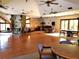 Spacious community room featuring a fireplace, tables and chairs, and ample lighting at 6012 Oak Creek Ln # 1913, Bradenton, FL 34210