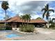 Beautiful community with lush landscaping, covered parking, and convenient accessible parking at 6012 Oak Creek Ln # 1913, Bradenton, FL 34210