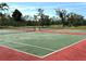 Well-maintained tennis courts provides great opportunity for outdoor recreation and competitive matches at 6012 Oak Creek Ln # 1913, Bradenton, FL 34210