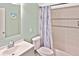 Bathroom features include a shower-tub combo, toilet, and single sink vanity at 6023 Mayberry Ave, North Port, FL 34287