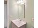 Bathroom featuring a single sink vanity, mirror, and overhead lighting at 6023 Mayberry Ave, North Port, FL 34287