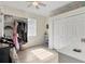 Spacious walk-in closet featuring custom shelving, closet rod, and overhead storage at 6357 Royal Tern Cir, Lakewood Ranch, FL 34202