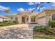 Charming single-story home featuring a two-car garage, and meticulous landscaping at 6357 Royal Tern Cir, Lakewood Ranch, FL 34202