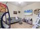 Cozy living room with comfortable seating and a wall-mounted television at 6357 Royal Tern Cir, Lakewood Ranch, FL 34202