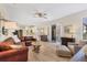 The living room offers ample seating, open to the kitchen and dining areas at 6357 Royal Tern Cir, Lakewood Ranch, FL 34202