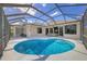 Backyard pool is fully screened in for comfortable swimming, relaxing and sunbathing at 6357 Royal Tern Cir, Lakewood Ranch, FL 34202