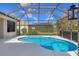 Enclosed pool area with calming blue waters and ample space to entertain guests at 6357 Royal Tern Cir, Lakewood Ranch, FL 34202
