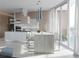 Modern kitchen with large center island, stainless steel appliances and outdoor views at 688 Golden Gate Point # 302, Sarasota, FL 34236