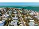 Aerial view of a light blue home, centrally located, with easy access to beaches at 709 N Bay Blvd, Anna Maria, FL 34216