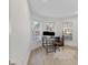 Bright office space featuring multiple windows and a modern desk setup at 7135 Royal George Ct, Wesley Chapel, FL 33545