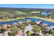 Residential neighborhood features luxury homes around a golf course and lake at 7327 Greystone St, Lakewood Ranch, FL 34202