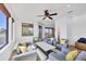 Bright living room featuring modern furniture and a beautiful view of the neighborhood at 7327 Greystone St, Lakewood Ranch, FL 34202