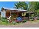 Quaint roadside farm market featuring fresh produce and seasonal plants at 7816 15Th Nw Ave, Bradenton, FL 34209