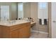 Bathroom with double sink vanity, large mirror and full length mirror at 8224 Waterview Blvd, Lakewood Ranch, FL 34202