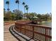Charming pier with gazebo overlooking the serene lake, perfect for leisurely strolls and enjoying the peaceful surroundings at 8224 Waterview Blvd, Lakewood Ranch, FL 34202