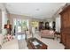 Inviting living room with neutral tones and large windows for ample natural light at 8224 Waterview Blvd, Lakewood Ranch, FL 34202