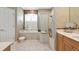 Luxurious main bathroom with a soaking tub, separate shower, and neutral finishes at 8224 Waterview Blvd, Lakewood Ranch, FL 34202