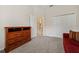 Bedroom with a dresser, closet, and doorway leading to other rooms, offering ample storage at 866 Placid Lake Dr, Osprey, FL 34229