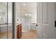 Main bathroom featuring a glass enclosed shower and a soaking tub under a window at 866 Placid Lake Dr, Osprey, FL 34229