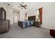 This is the main bedroom with a ceiling fan, carpet, neutral walls and lots of natural light at 866 Placid Lake Dr, Osprey, FL 34229