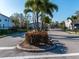 Gated community entrance with lush landscaping and secure access for residents and guests at 8681 Daydream St, Sarasota, FL 34238