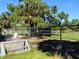 Culverhouse Community Garden with plots surrounded by fencing, offering a space for residents to grow at 8681 Daydream St, Sarasota, FL 34238